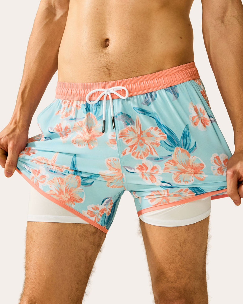 ChinoWaveII Pink Flowers Swim Trunks, Blue and White | Maamgic