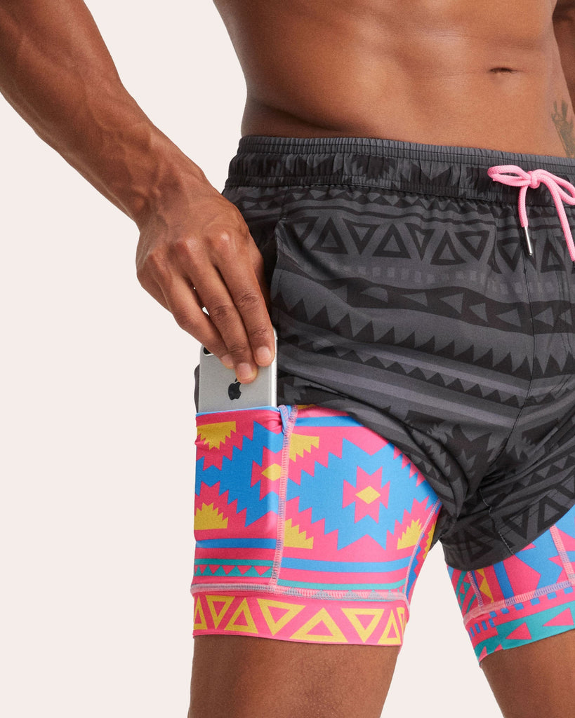 FlipFlicker Pink Geo Swim Trunks