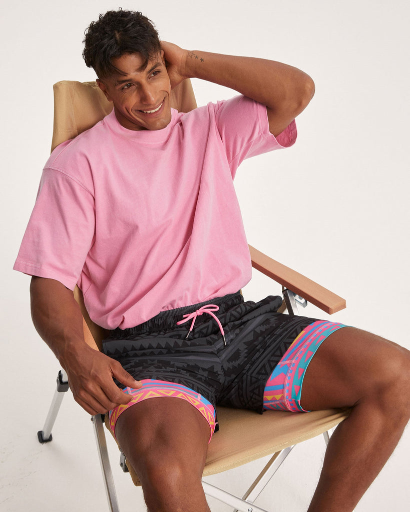 FlipFlicker Pink Geo Swim Trunks