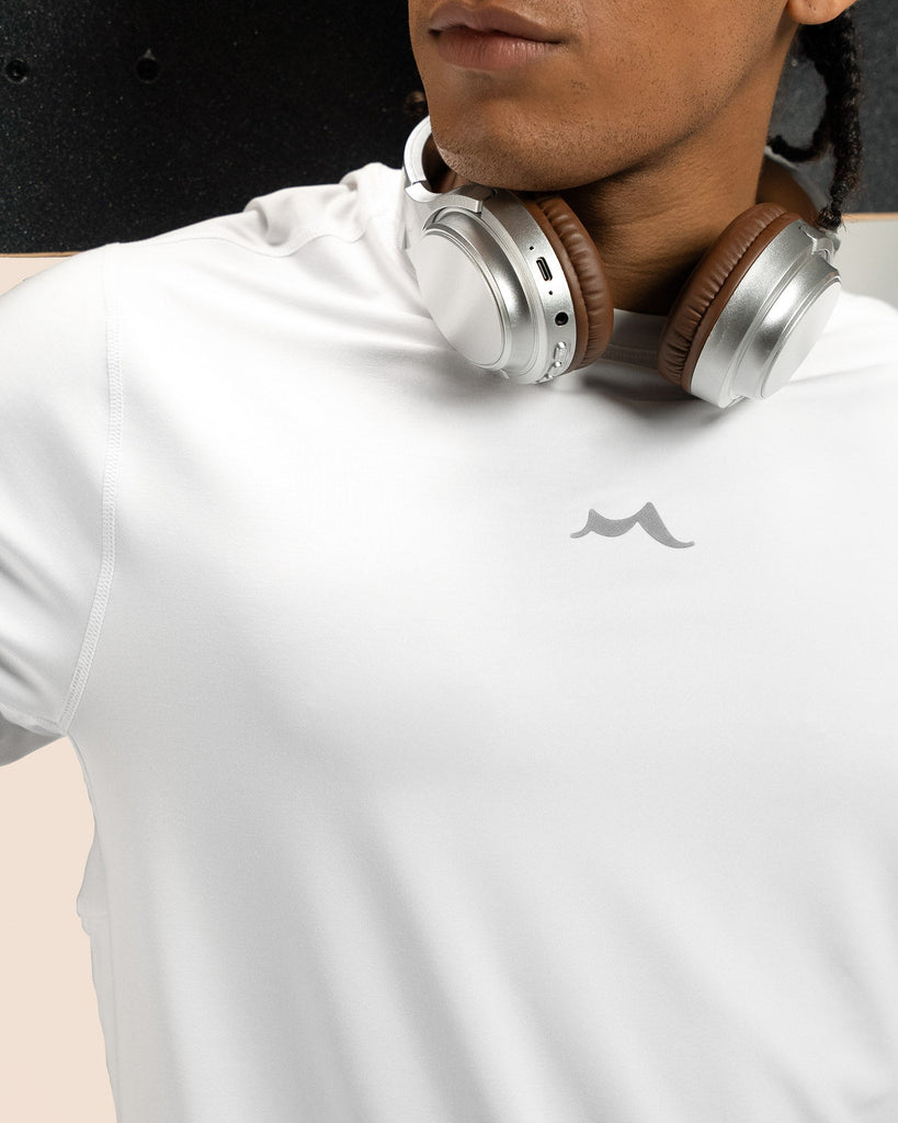 Close-up of soft, lightweight fabric texture of white long sleeve shirt